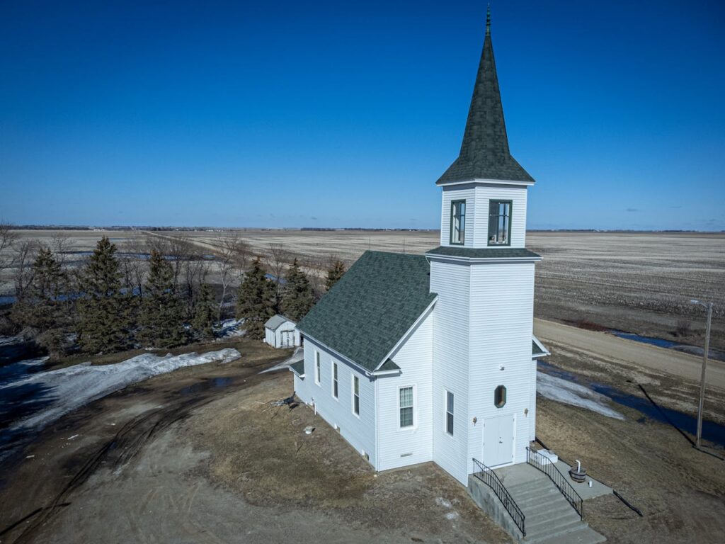 An Aerial Shot of a Church in the Countryside